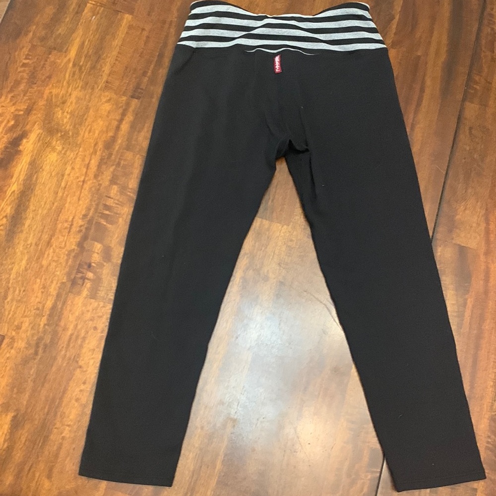 Hard Tail size small Black Capris with striped waistband.